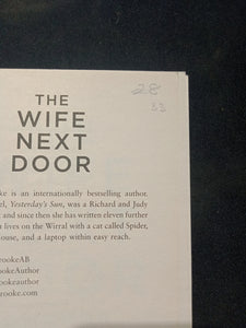 The Wife Next Door by Amanda Brooke