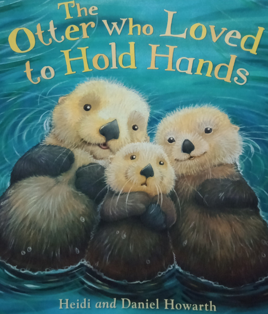 The Otter Who Loved To Hold Hands by Heidi And Daniel Howarth